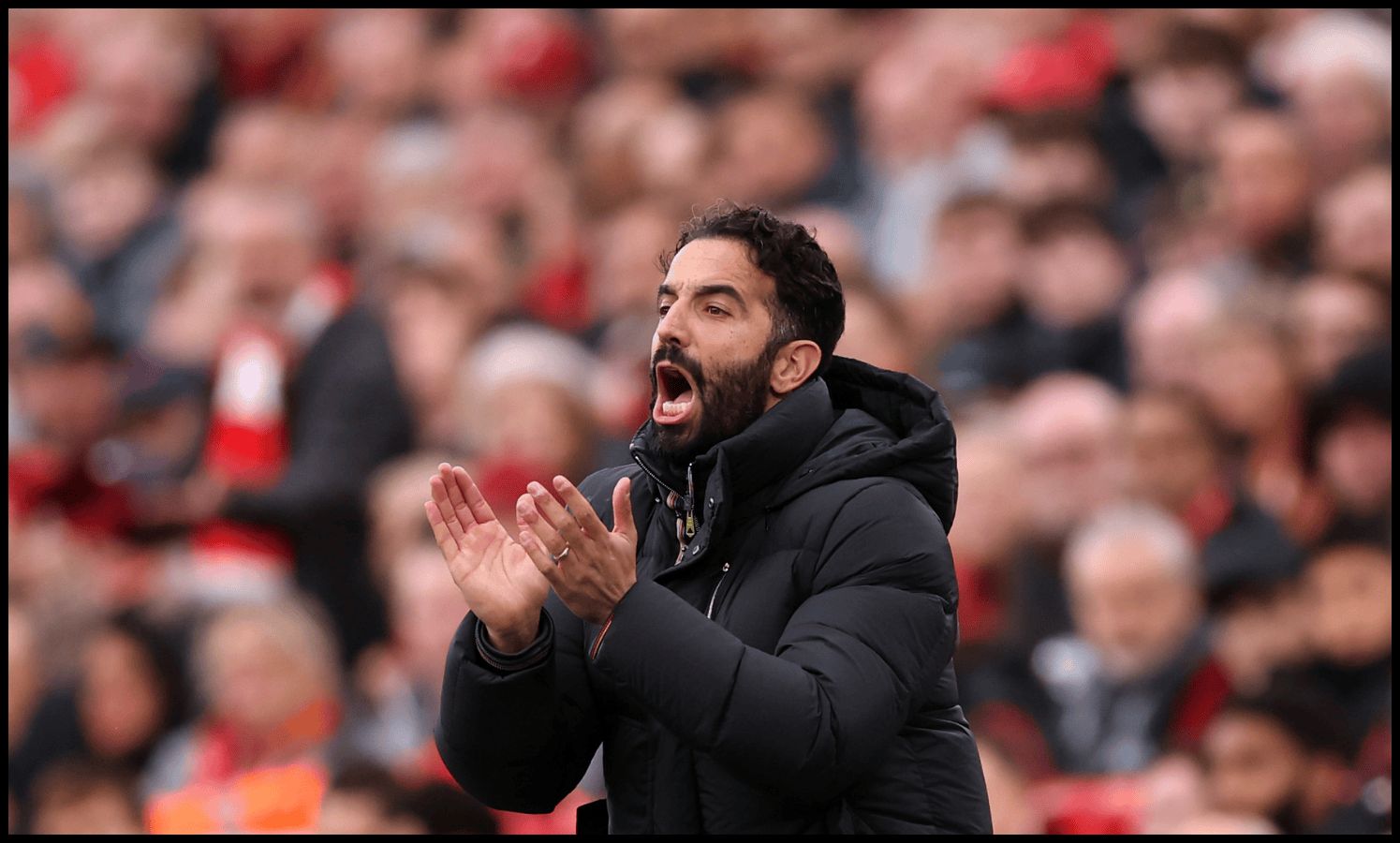 Ruben Amorim shouts instructions from the touchline at Anfield.