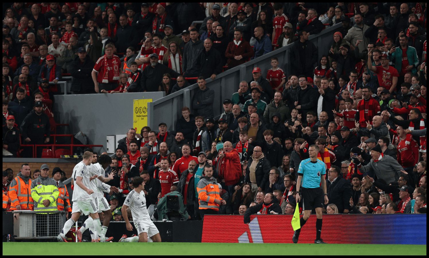 Harry Maguire celebrates after scoring the winning goal at Anfield.