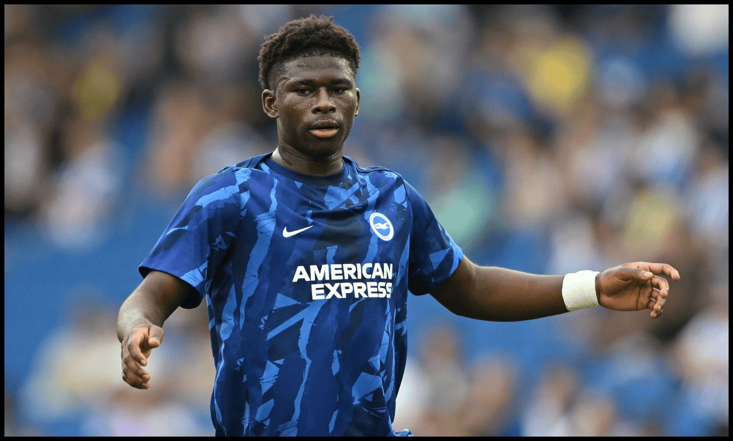 Carloa Baleba warms up ahead of kick-off.