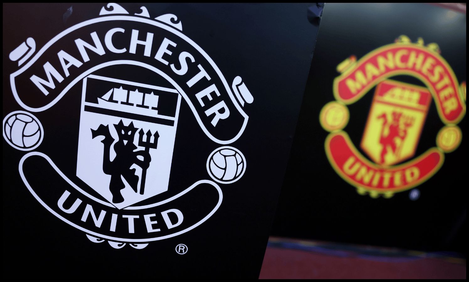 Man United logo on display at Old Trafford.