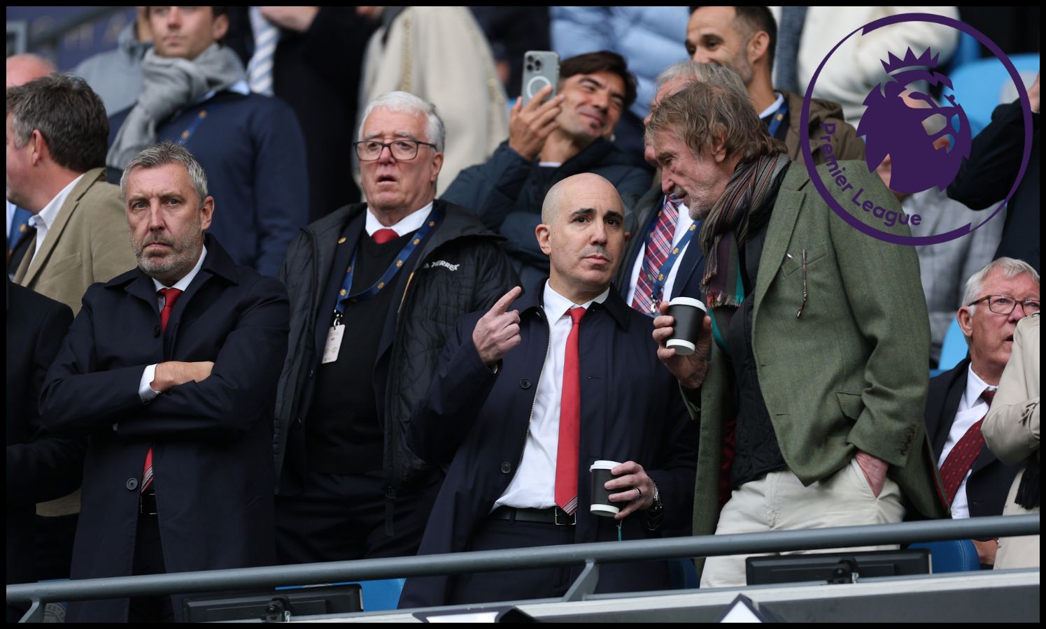 Manchester United officials in the stands