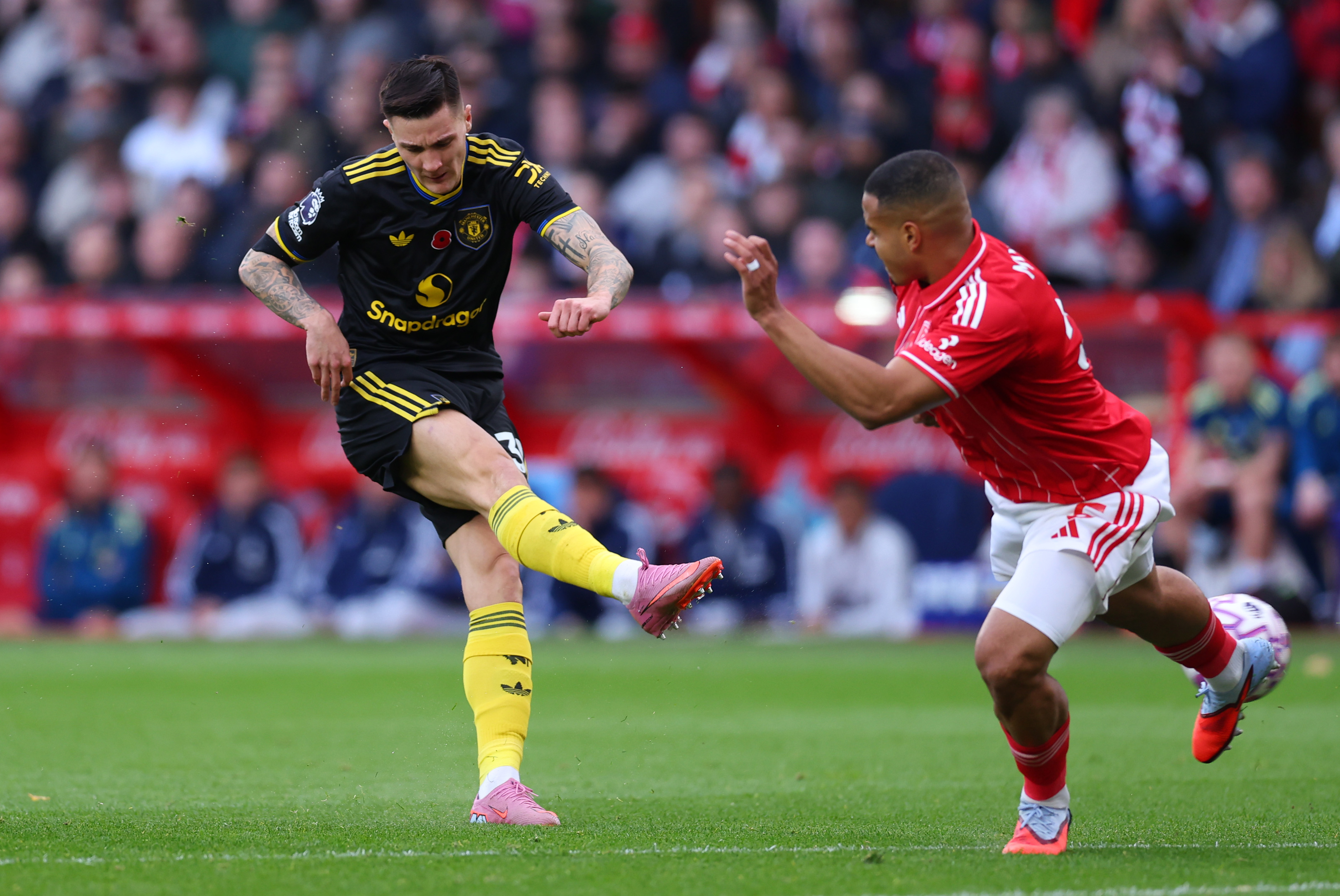 Benjamin Sesko takes a shot whilst up against Murillo at Nottingham Forest’s City Ground.