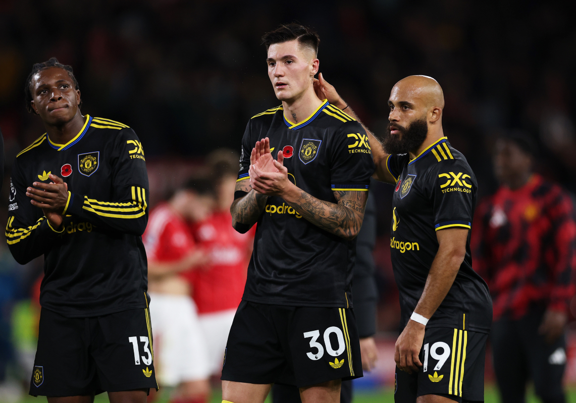 Patrick Dorgu, Benjamin Sesko and Bryan Mbeumo applaud the travelling Man United fans at the City Ground.