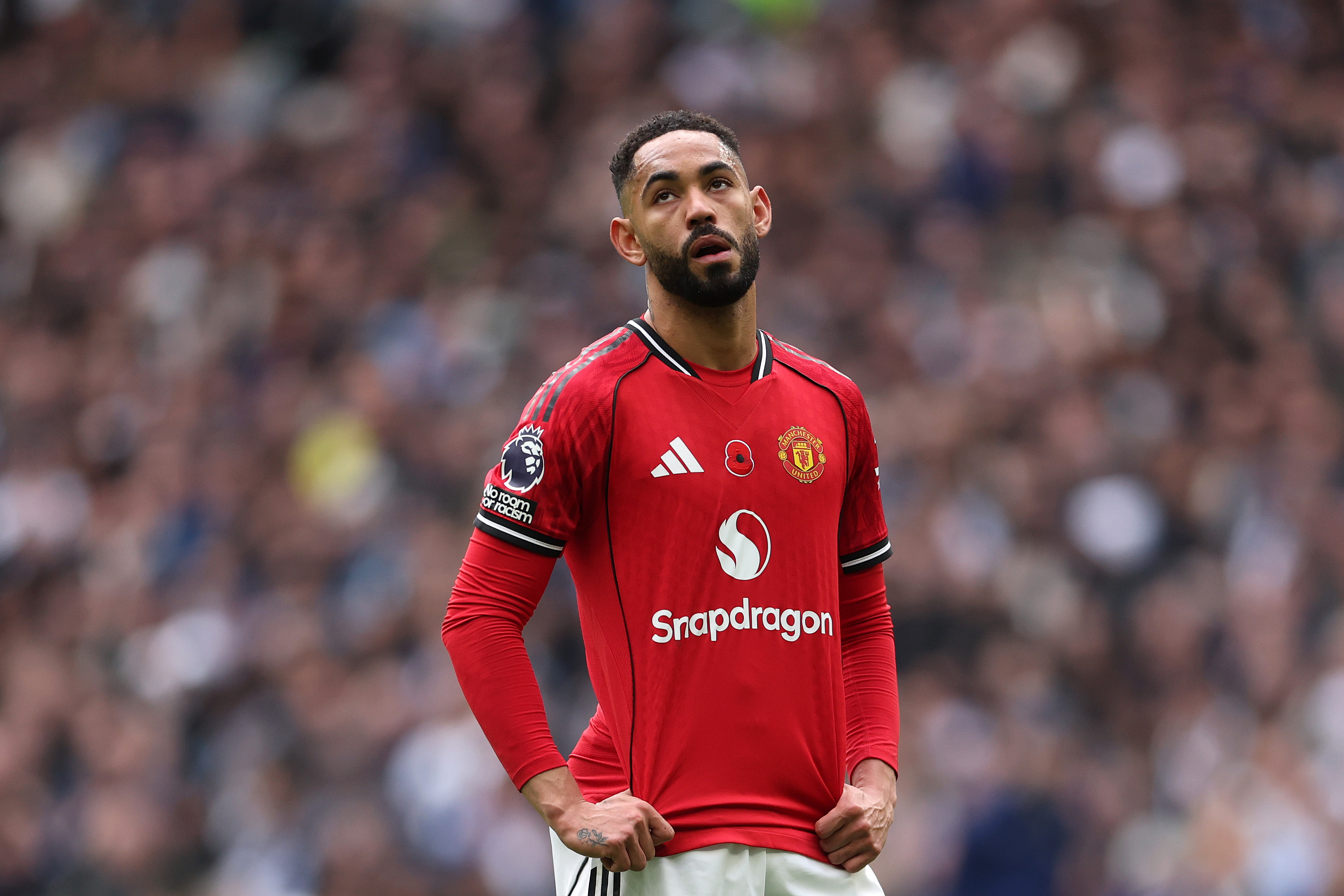 Matheus Cunha looks dejected while in action for Man United.