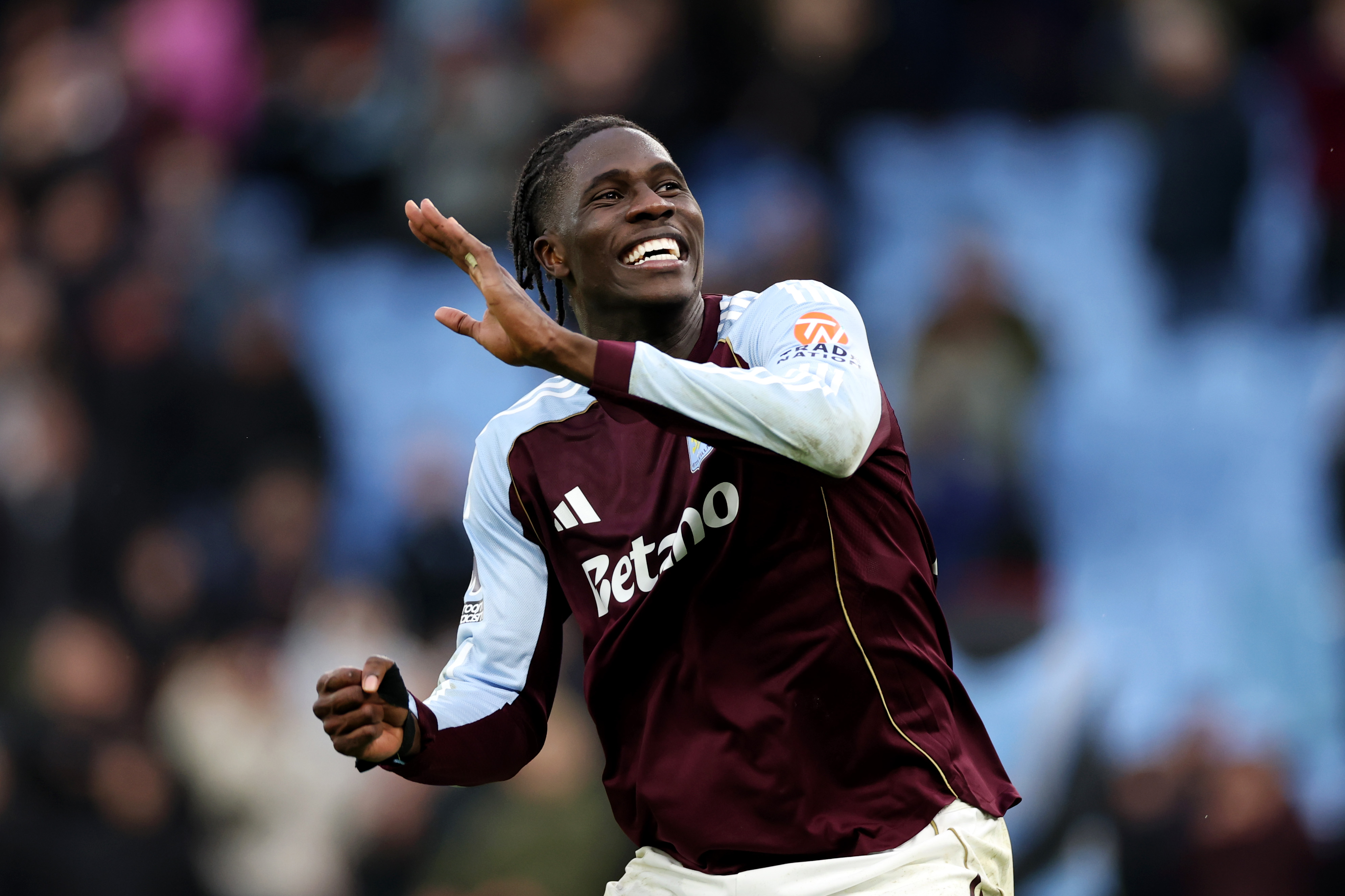 Amadou Onana celebrates with the Aston Villa fans.