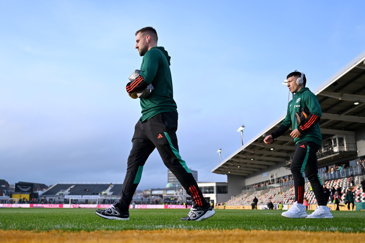 Luke Shaw and Lisandro Martinez arrive at Newport County’s stadium.