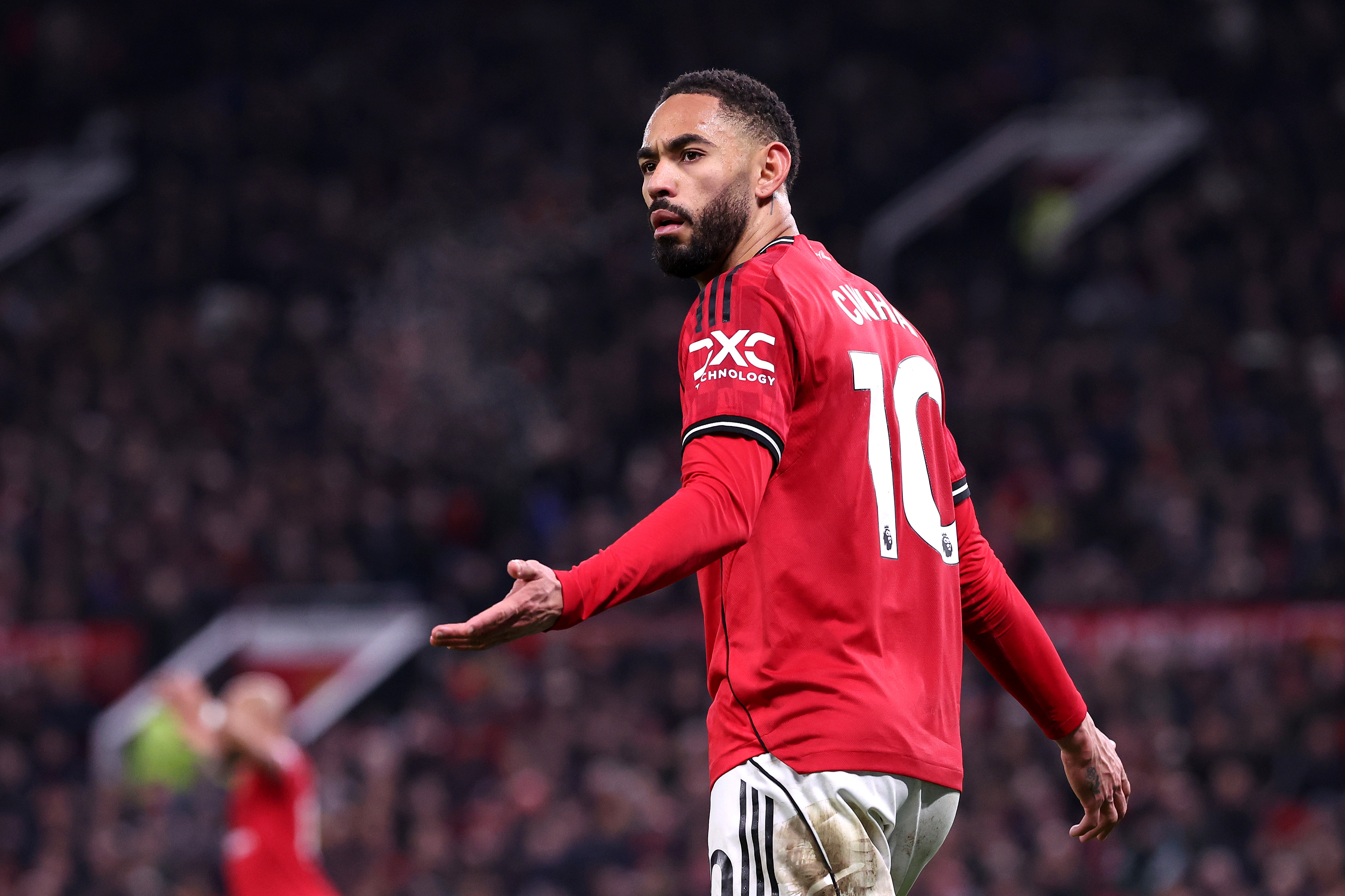 Matheus Cunha reacts while in action for Man United against West Ham.