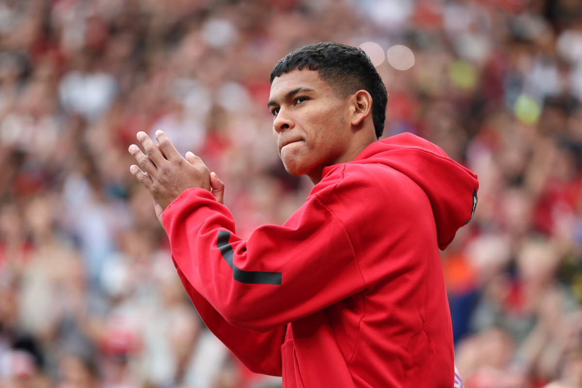 Diego Leon applauds the Man United fans after being unveiled at Old Trafford.