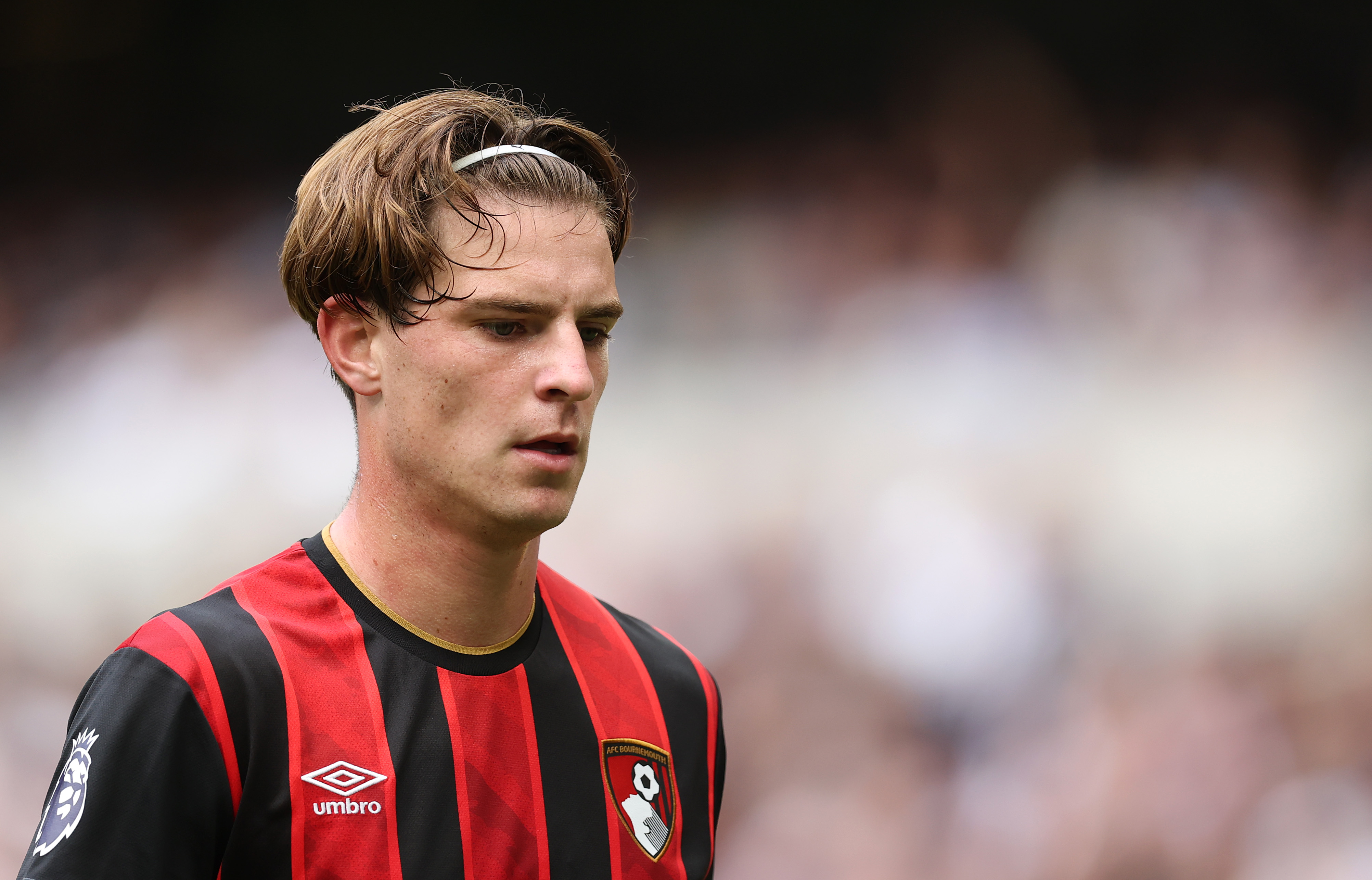 Alex Scott looks on while in action for Bournemouth against Tottenham.