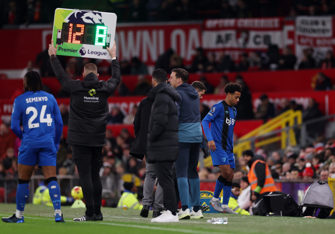 Tyler Adams walks off after suffering an injury at Old Trafford.