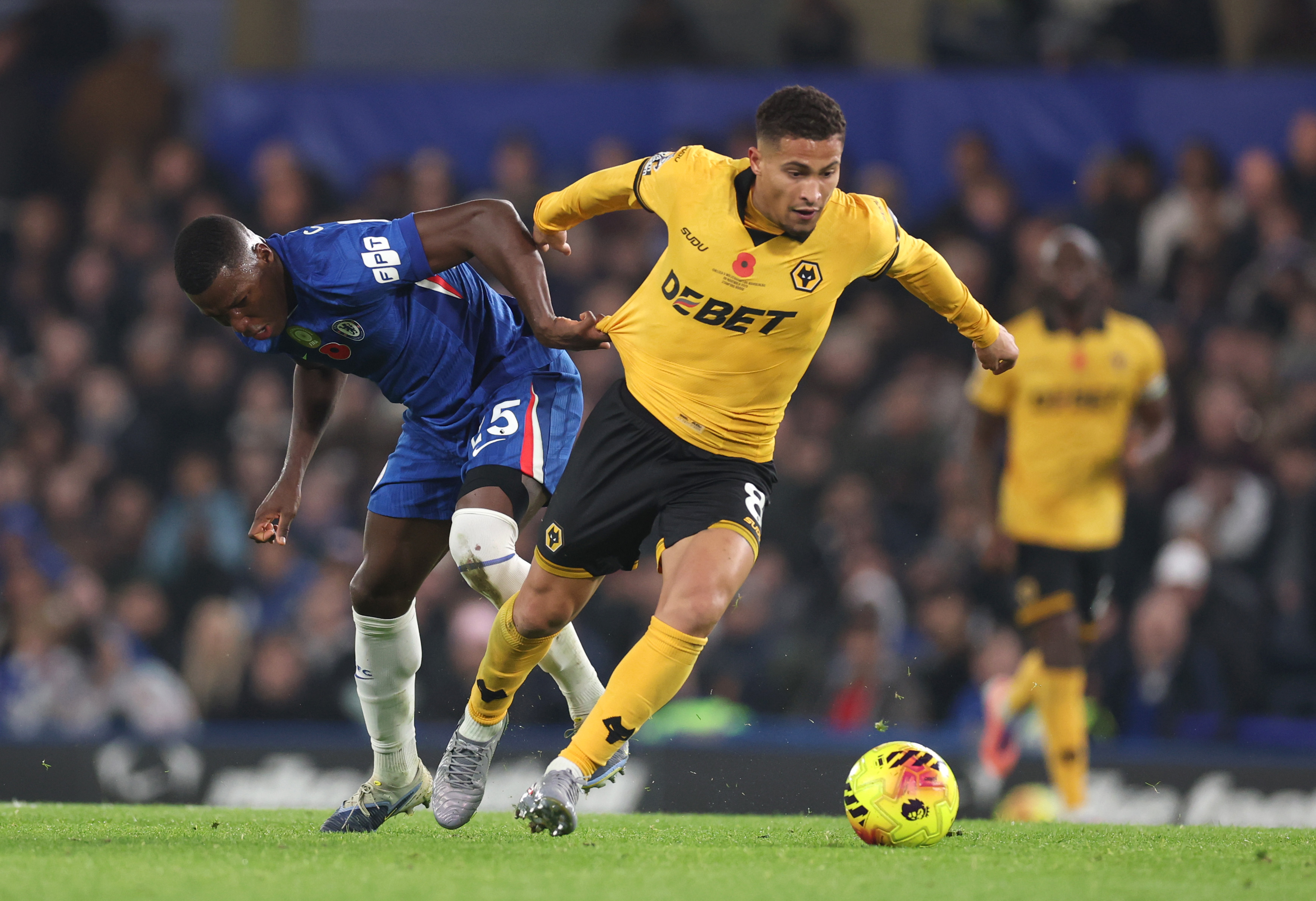 Joao Gomes in action against Chelsea