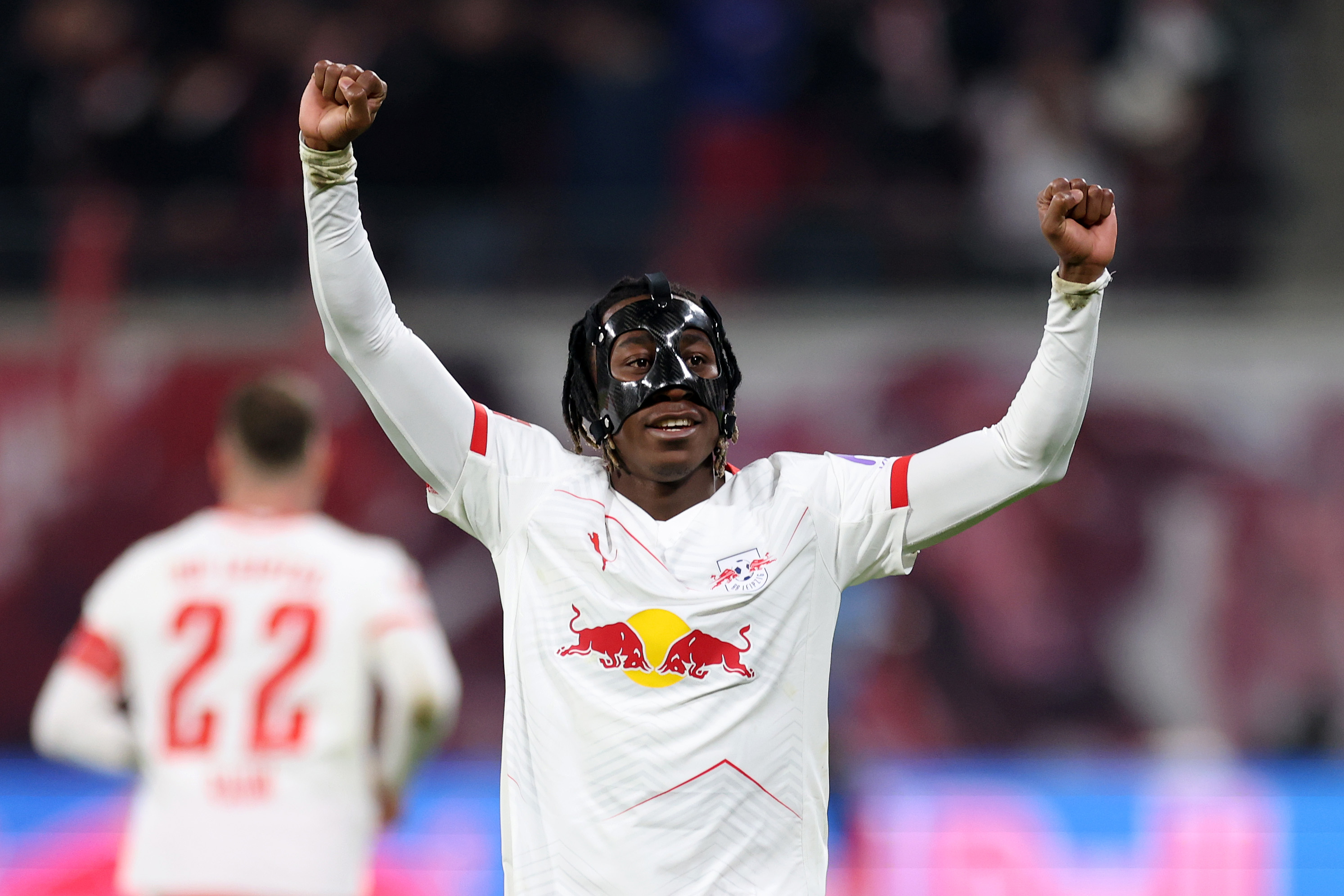 Yan Diomande celebrating with RB Leipzig fans