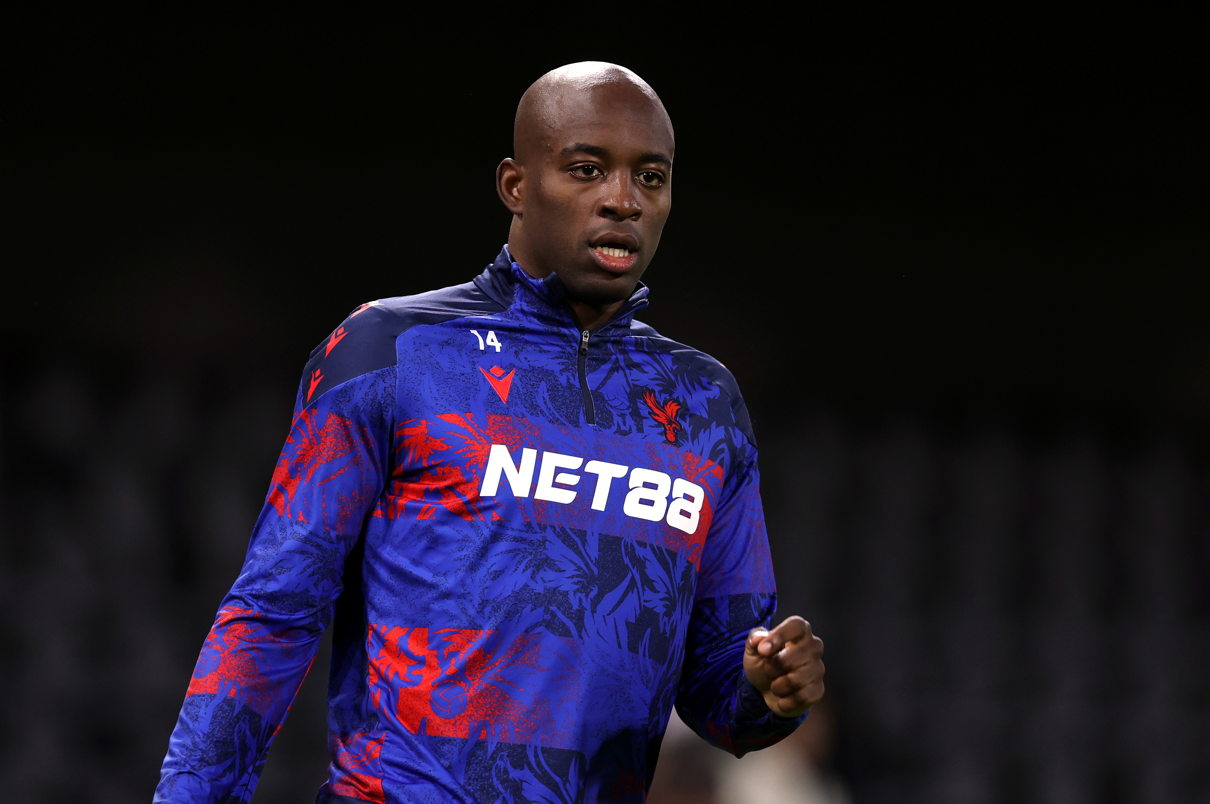 Jean-Philippe Mateta warms up before kick-off.