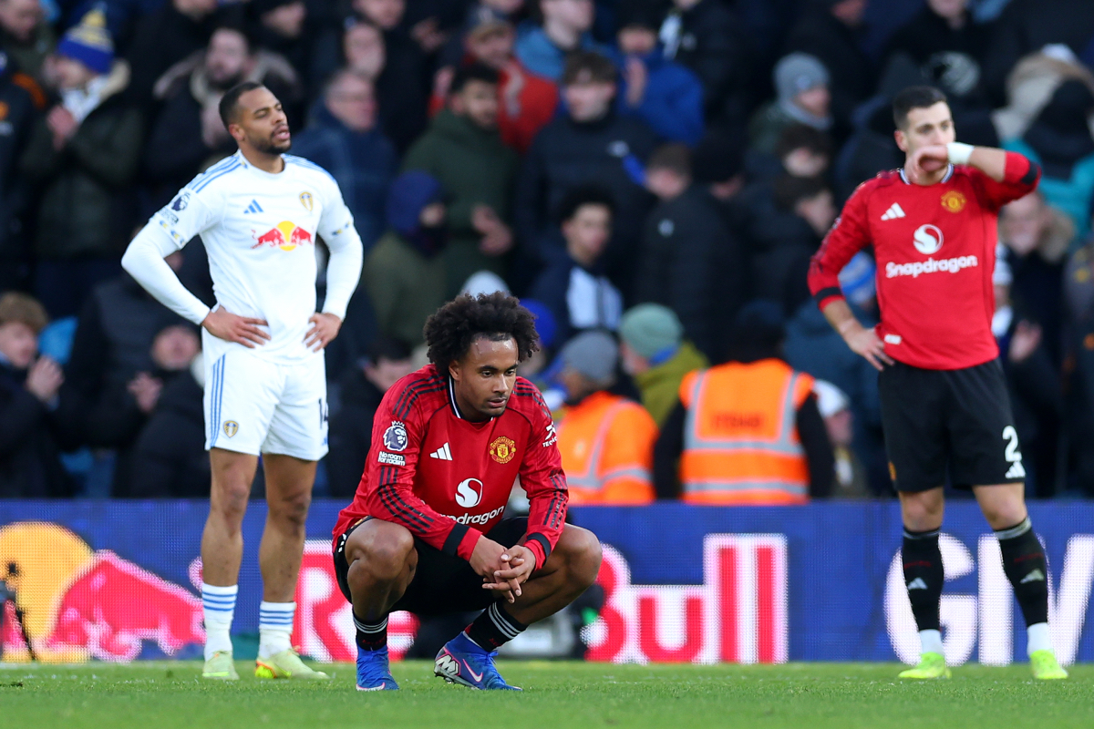 Joshua Zirkzee slumps to the floor after Man United draw with Leeds.