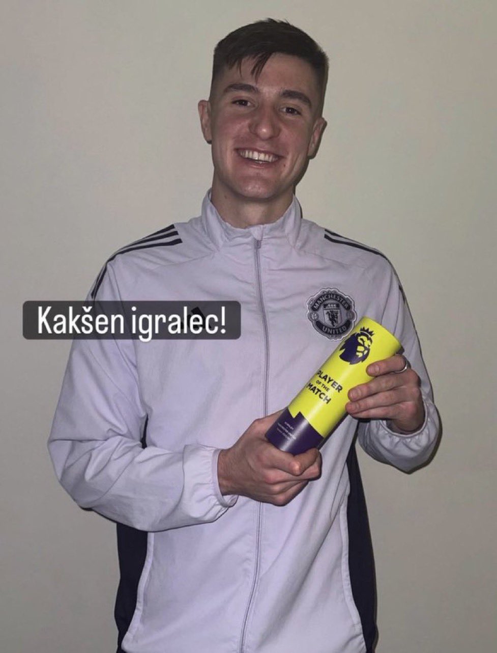 Benjamin Sesko poses with his Player of the Match award.