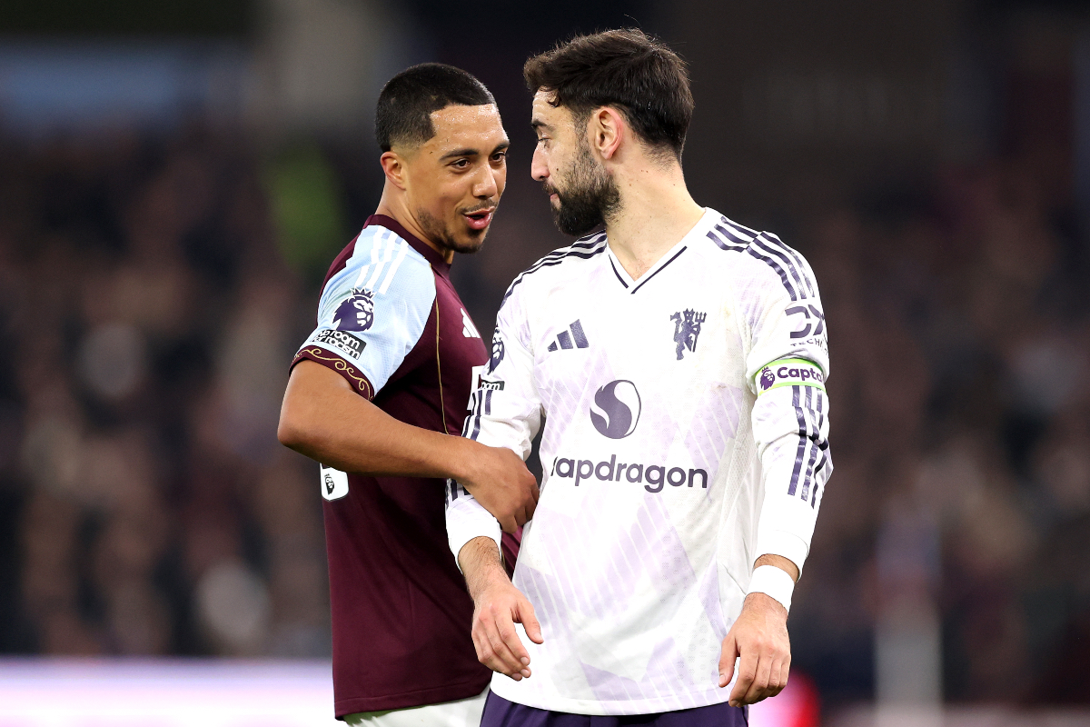 Bruno Fernandes and Youri Tielemans converse during Aston Villa vs Man United. 