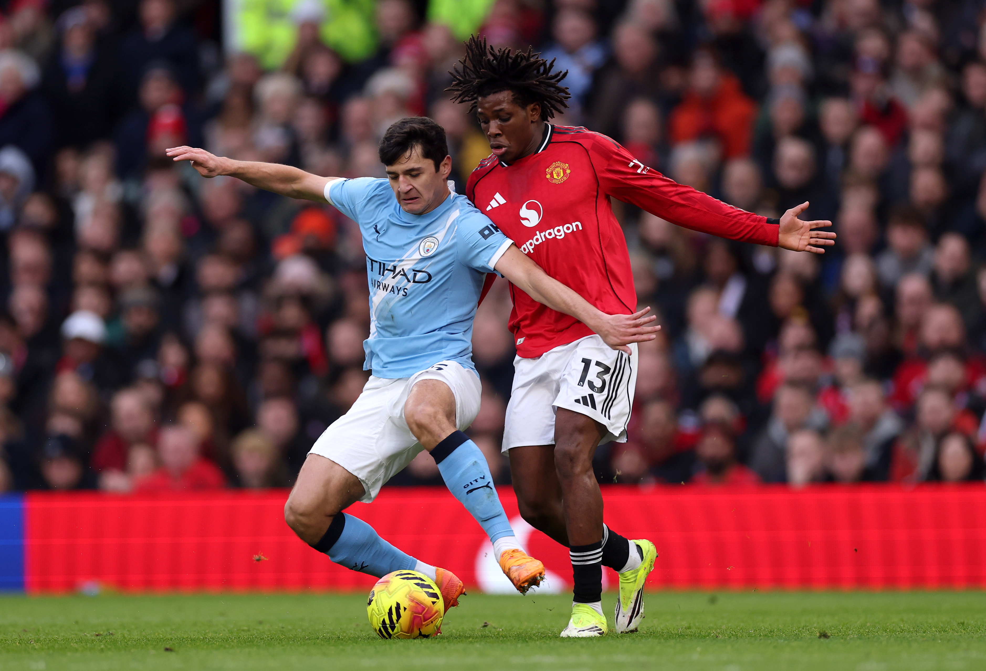 Patrick Dorgu vies for possession with Abdukodir Khusanov. 