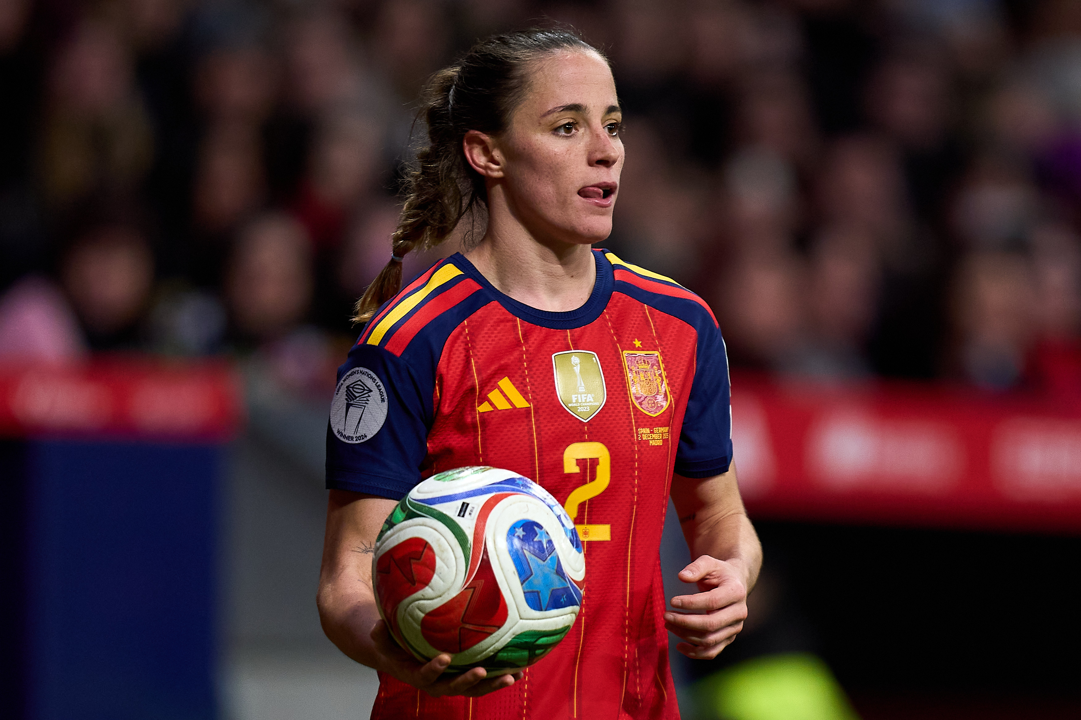 Ona Batlle goes to take a throw-in while in action for Spain. 