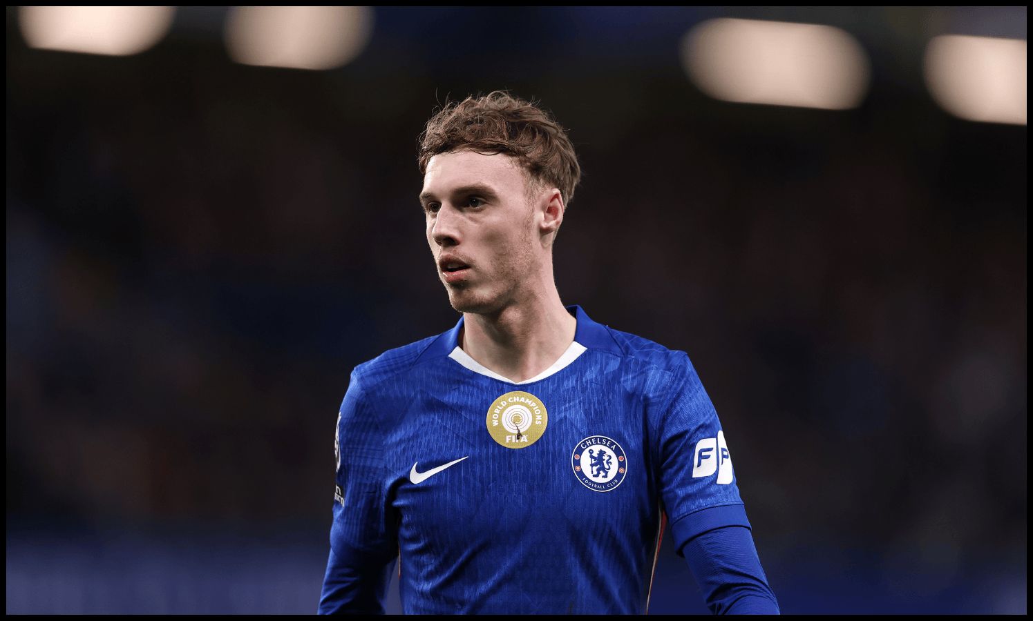 Cole Palmer looks on while in action for Chelsea against Brentford.