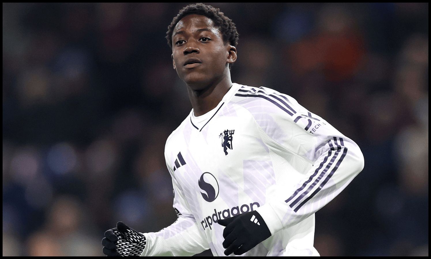 Kobbie Mainoo in action vs Burnley.