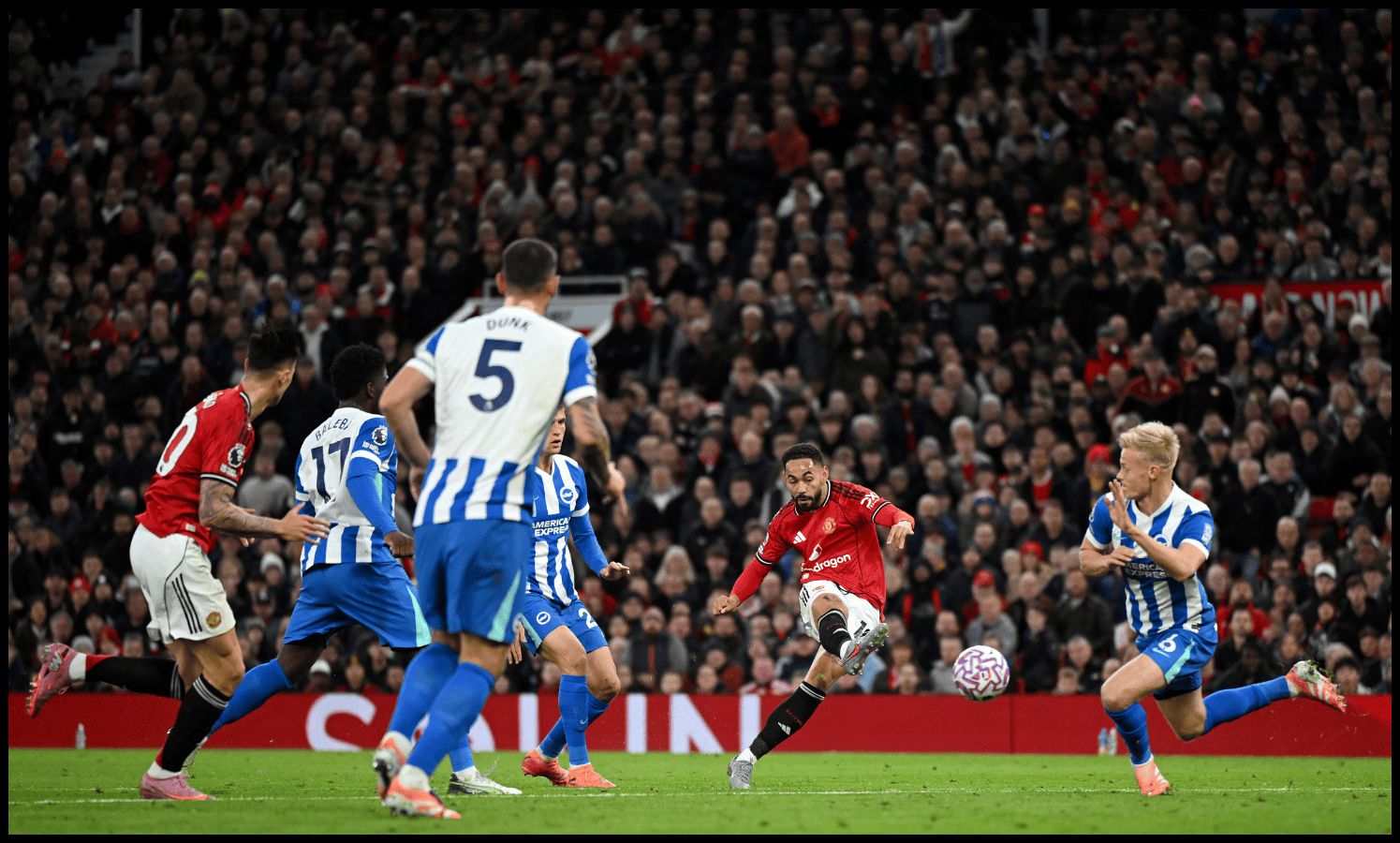 MANCHESTER, ENGLAND - OCTOBER 25: Matheus Cunha of Manchester United scores his team's first goal during the Premier League match between Manchester United and Brighton & Hove Albion at Old Trafford on October 25, 2025 in Manchester, England. (Photo by Shaun Botterill/Getty Images)