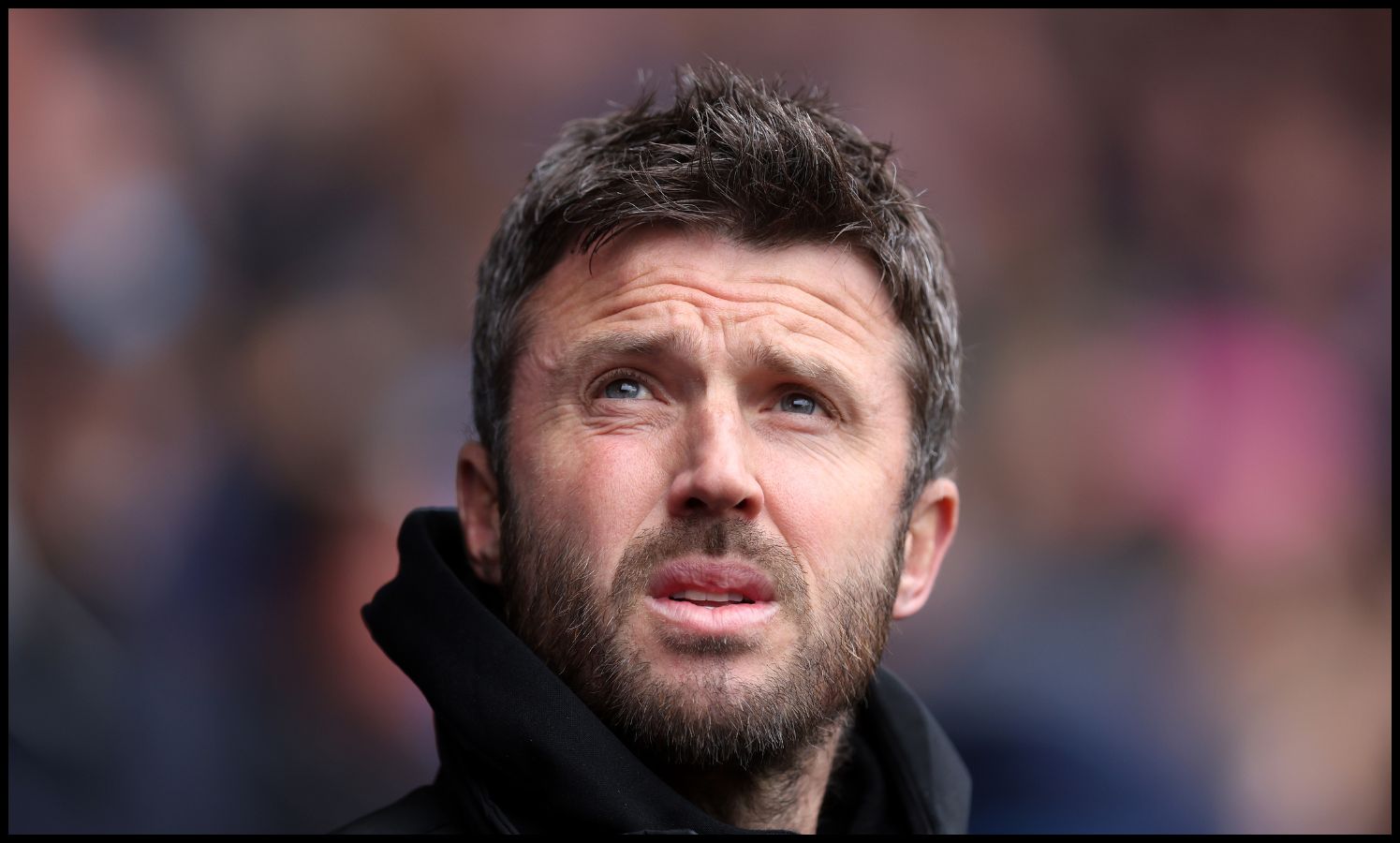 Michael Carrick looking on