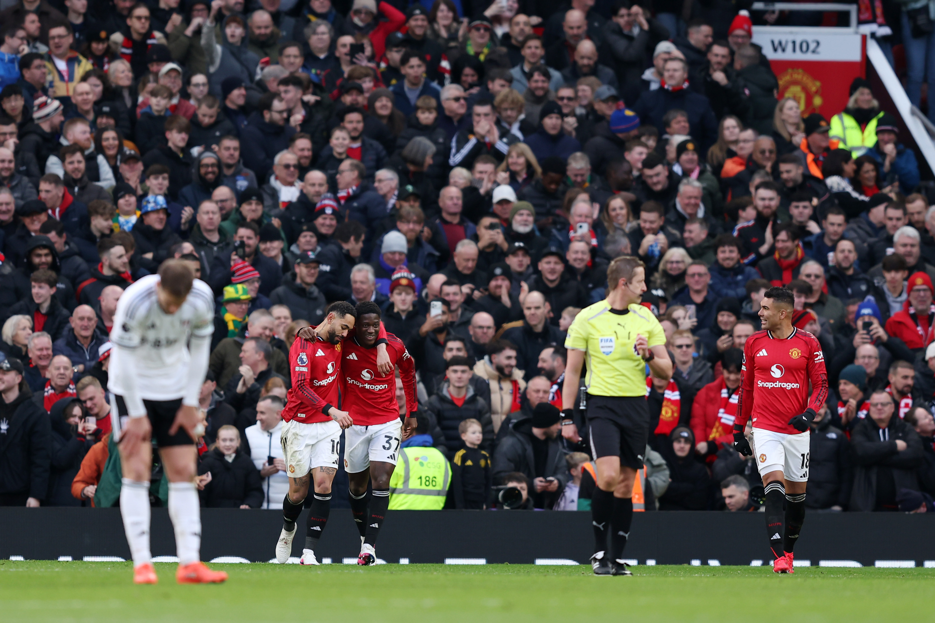 Matheus Cunha celebrates alongside Kobbie Mainoo, who made his third successive start.