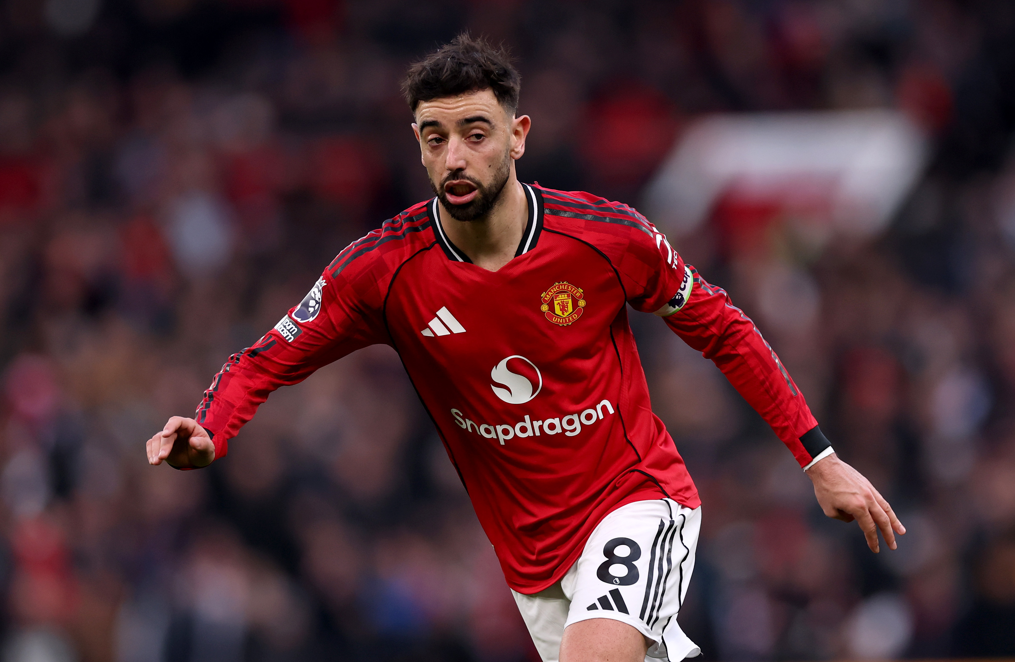 Bruno Fernandes looks on while in action vs Fulham. 