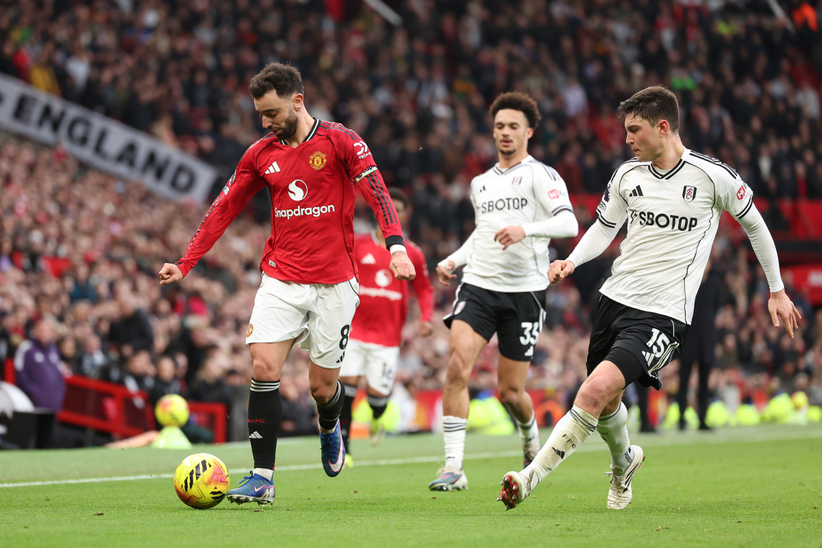 Bruno Fernandes carries the ball while under pressure from Jorge Cuenca.