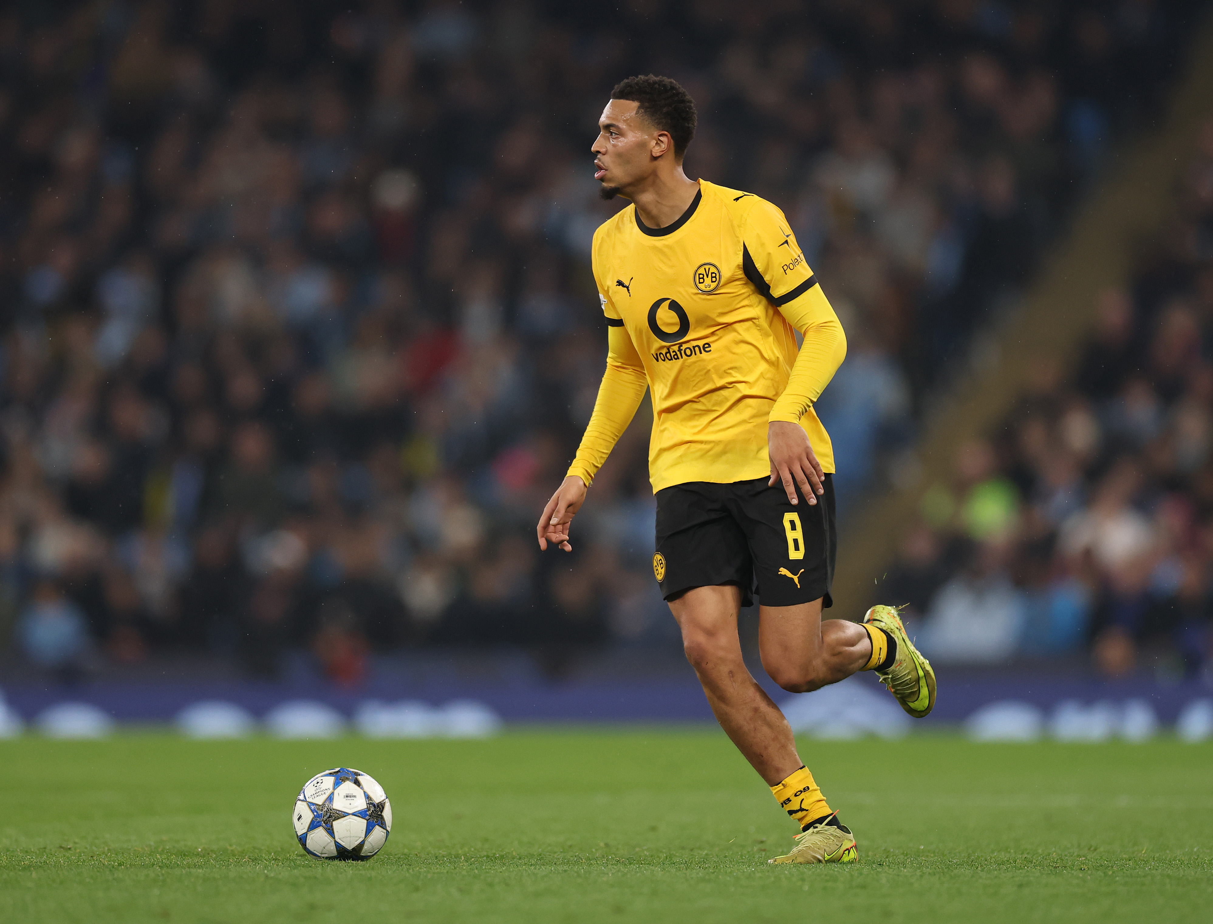 Dortmund’s Felix Nmecha runs with the ball.