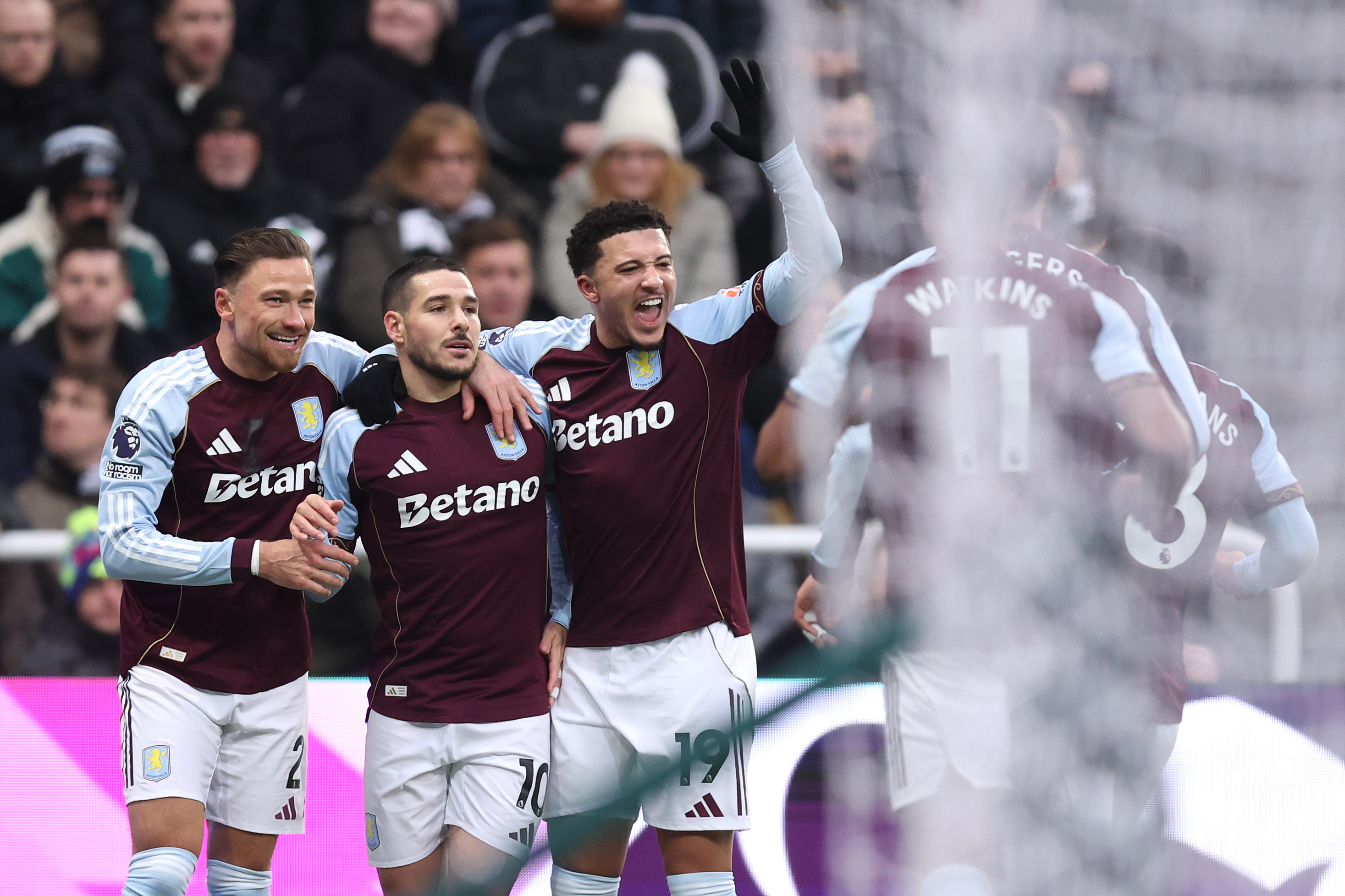 Matty Cash, Jadon Sancho and Emi Buendia celebrate the latter’s goal for Aston Villa.