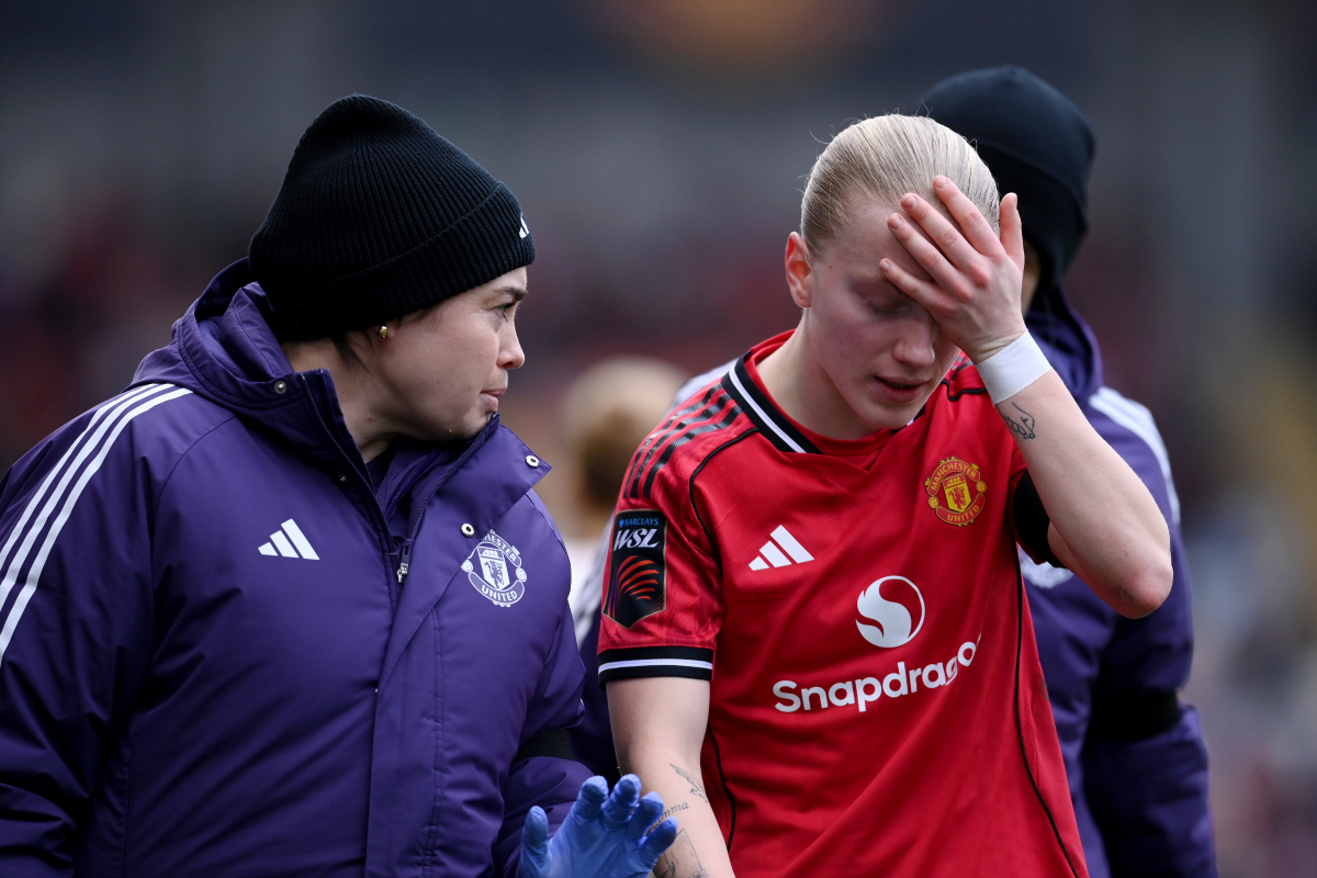 LEIGH, ENGLAND - FEBRUARY 01: Anna Sandberg of Manchester United walks off the pitch after receiving medical treatment during the Barclays Women's Super League match between Manchester United and Liverpool at Progress with Unity Stadium on February 01, 2026 in Leigh, England