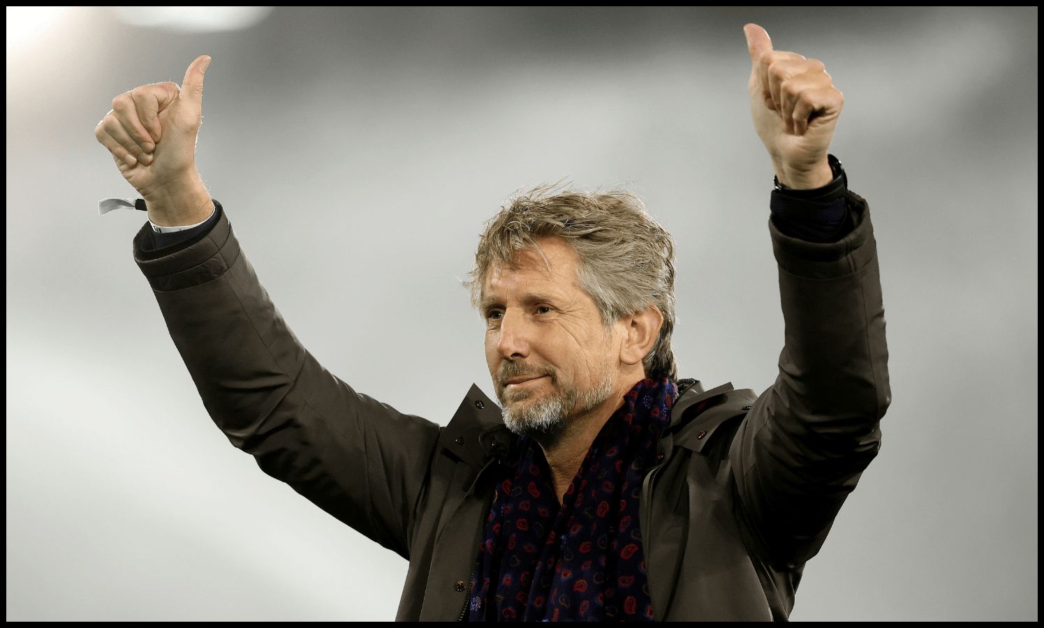 LONDON, ENGLAND - JANUARY 26: Edwin Van Der Sar, former Manchester United and Fulham player acknowledges the fans during the Premier League match between Fulham FC and Manchester United FC at Craven Cottage on January 26, 2025 in London, England.