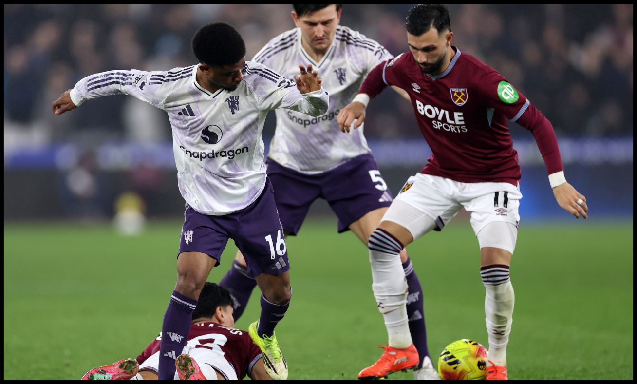 Harry Maguire with Amad Diallo and Taty Castellanos