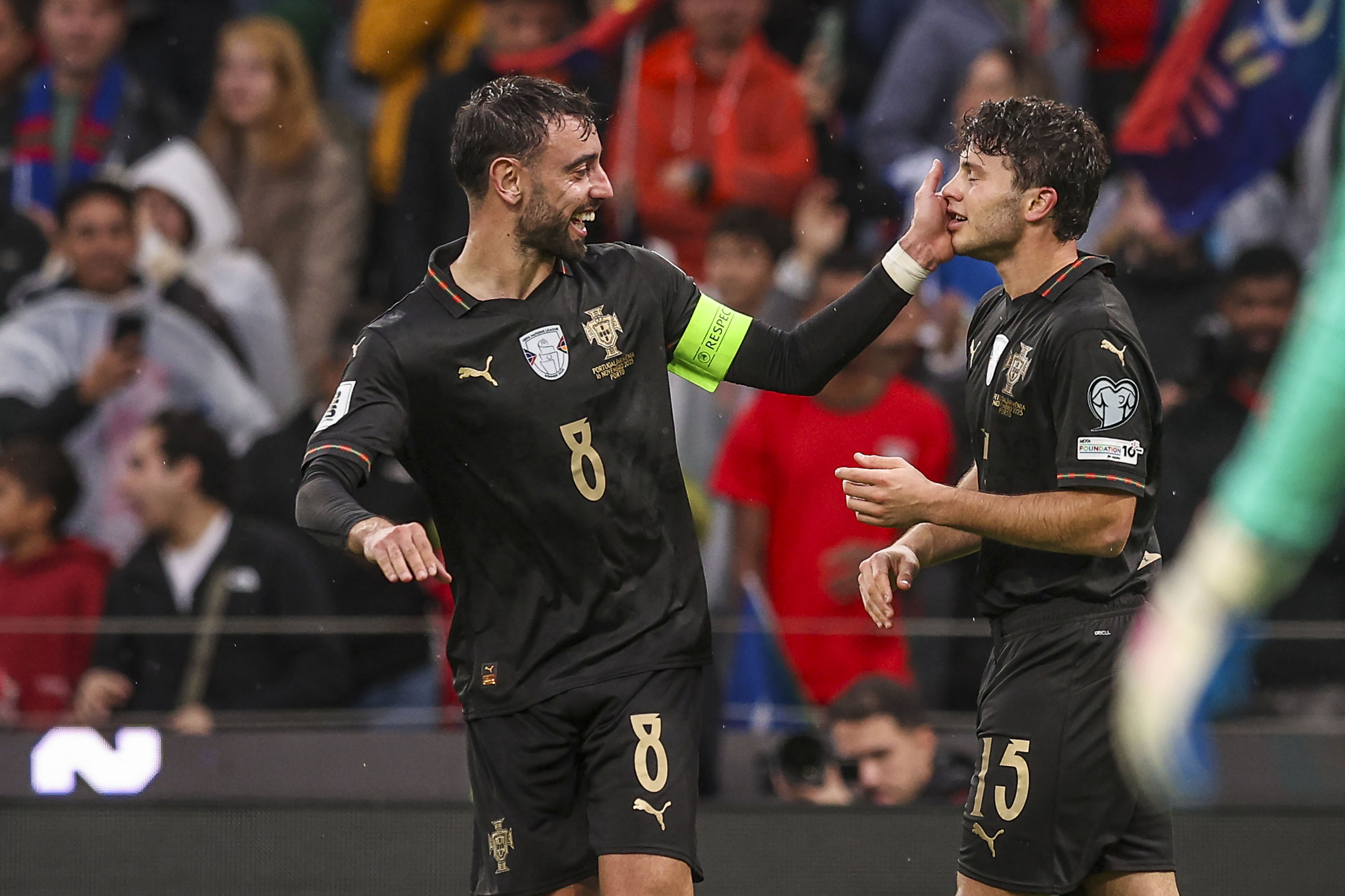 Bruno Fernandes celebrates with Joao Neves while in action for Portugal.