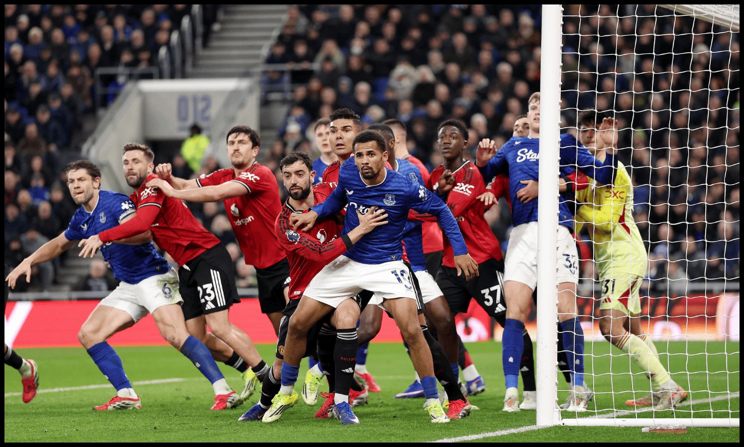 LIVERPOOL, ENGLAND - FEBRUARY 23: Bruno Fernandes of Manchester United competes with Iliman Ndiaye of Everton, as Everton take a corner kick, during the Premier League match between Everton and Manchester United at the Hill Dickinson Stadium on February 23, 2026 in Liverpool, England.