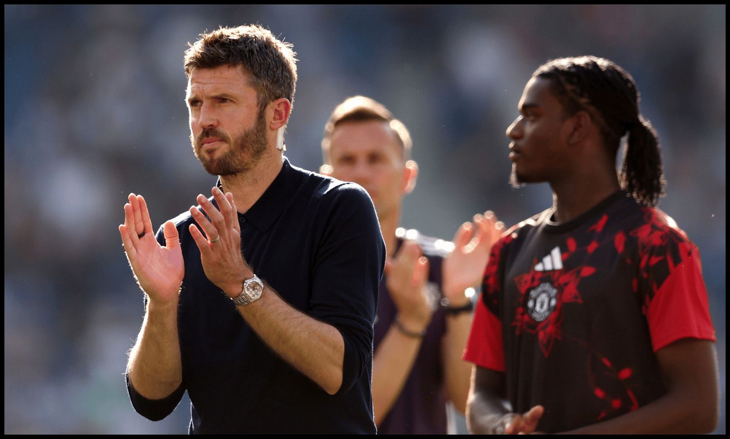 BRIGHTON, ENGLAND - MAY 24: Michael Carrick, Manager of Manchester United, applauds the fans after the Premier League match between Brighton & Hove Albion and Manchester United at the Amex Stadium on May 24, 2026 in Brighton, England.