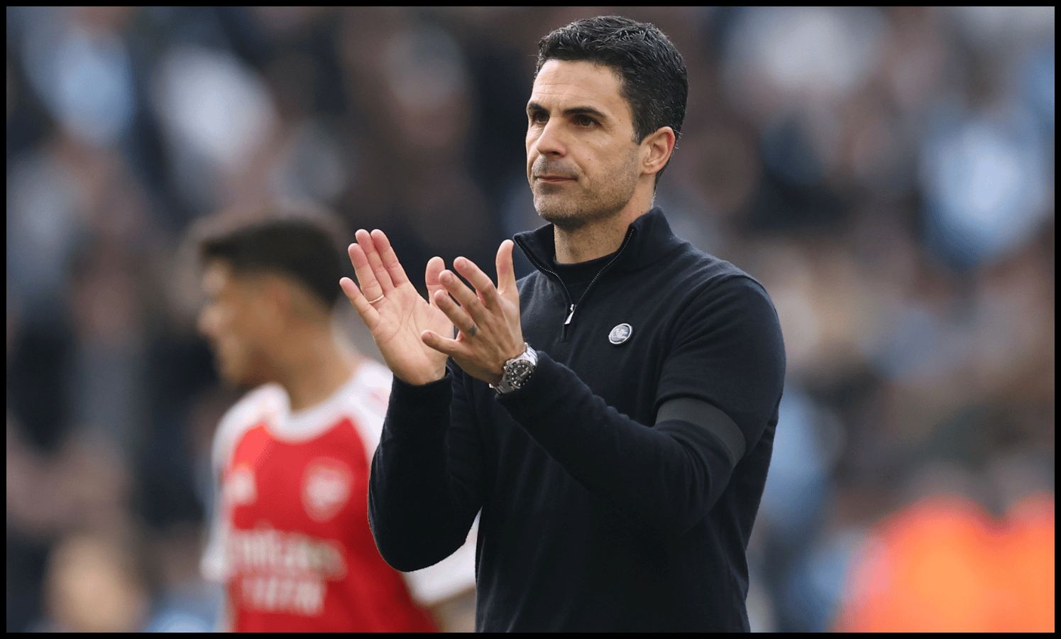 MANCHESTER, ENGLAND - APRIL 19: Mikel Arteta, Manager of Arsenal, applauds the fans after the Premier League match between Manchester City and Arsenal at Etihad Stadium on April 19, 2026 in Manchester, England
